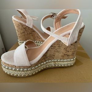 Blush suede wedges size says 35 fits 5/12 Or 6